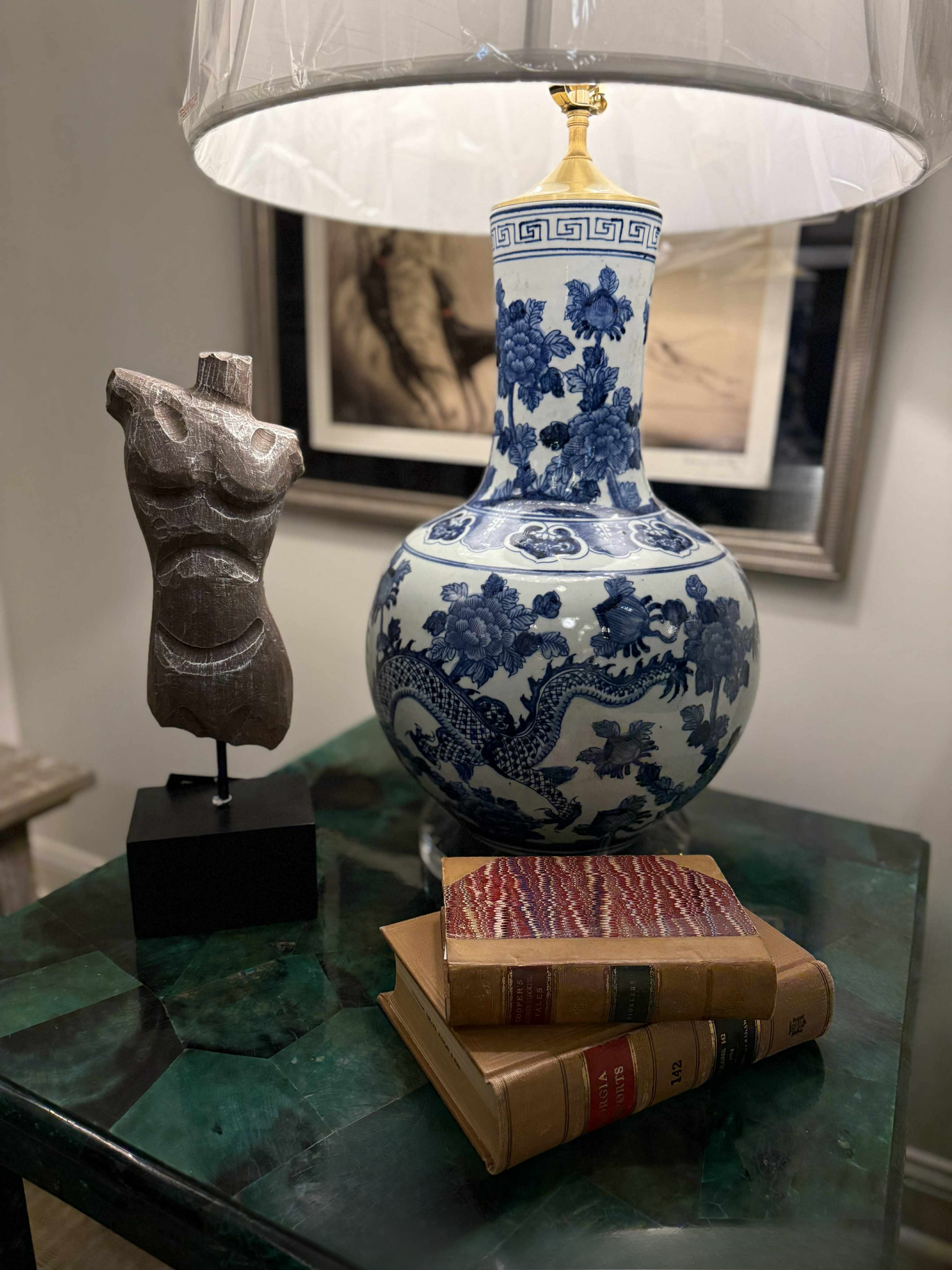 Side table vignette with lamp and accessories